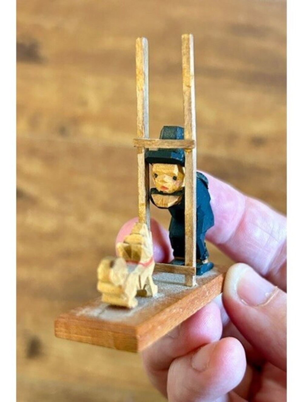 Vintage Hand-Carved Wooden Figurine of Man with Ladder and Dog